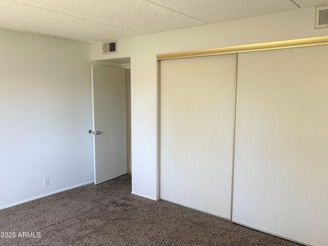 Building Photo - 7910 E Camelback Rd
