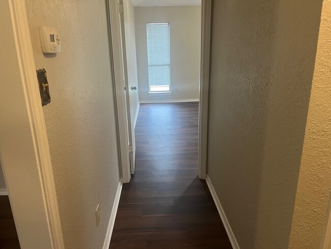 hallway to master bed - 2213 Oak Bluff Dr