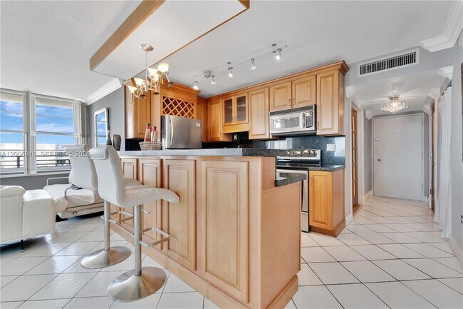 Building Photo - 5555 Collins Ave