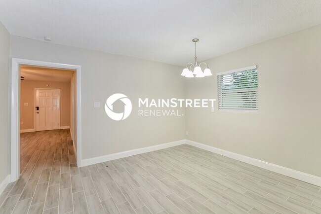 Building Photo - 4 Bedroom Pet-Friendly Home in ORLANDO, FL with Main Street Renewal
