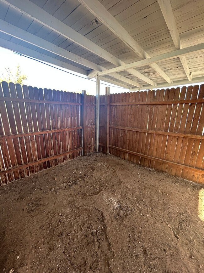 Building Photo - Two Bedroom w/ A/C, Yard and Carport