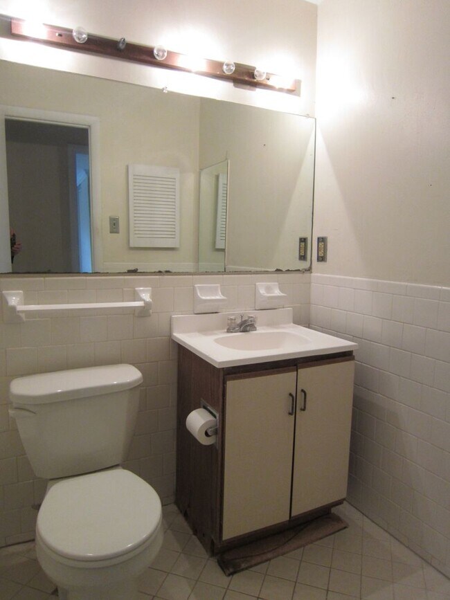 Building Photo - Conveniently located near Tysons, Metrobus, the Toll Road, and West Falls Metro.