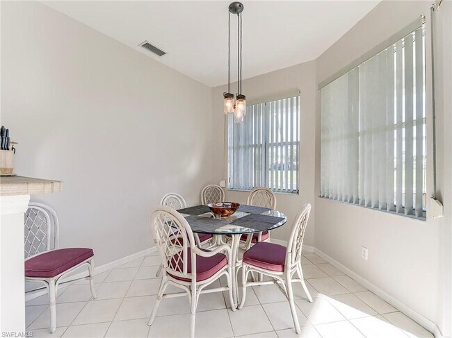 Building Photo - Turnkey 2-bedroom plus den villa, perfectly situated to capture stunning golf course and lake vie...