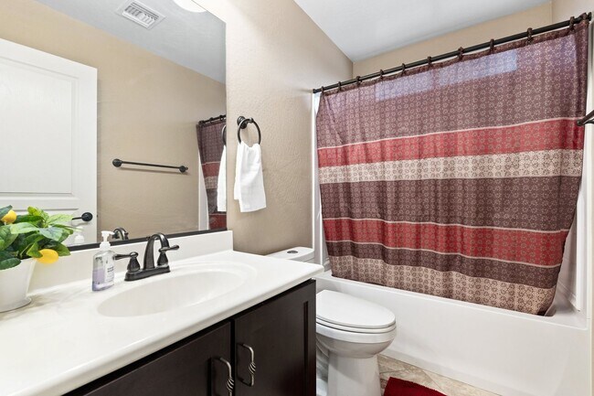 Building Photo - Welcome Home! This stunning 4 bedroom, 3 b...