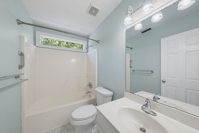 Building Photo - Southern Charm Meets Everyday Entertainment and Convenience!