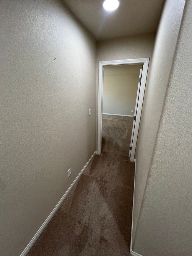 Building Photo - A Fantastic 4 Bedroom Home with the primary Downstairs, in Silverado Ranch