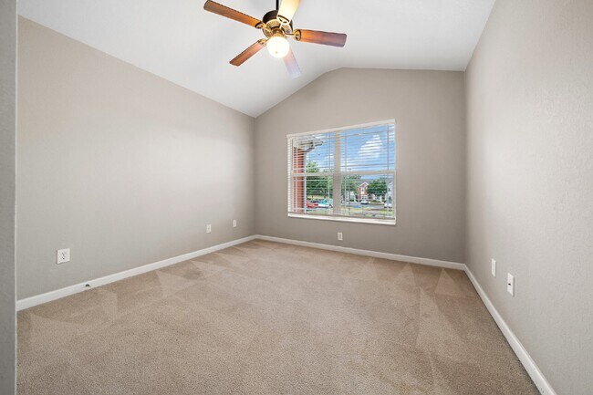 Building Photo - Corner Unit ~ Lake View ~ Maintenance Free...
