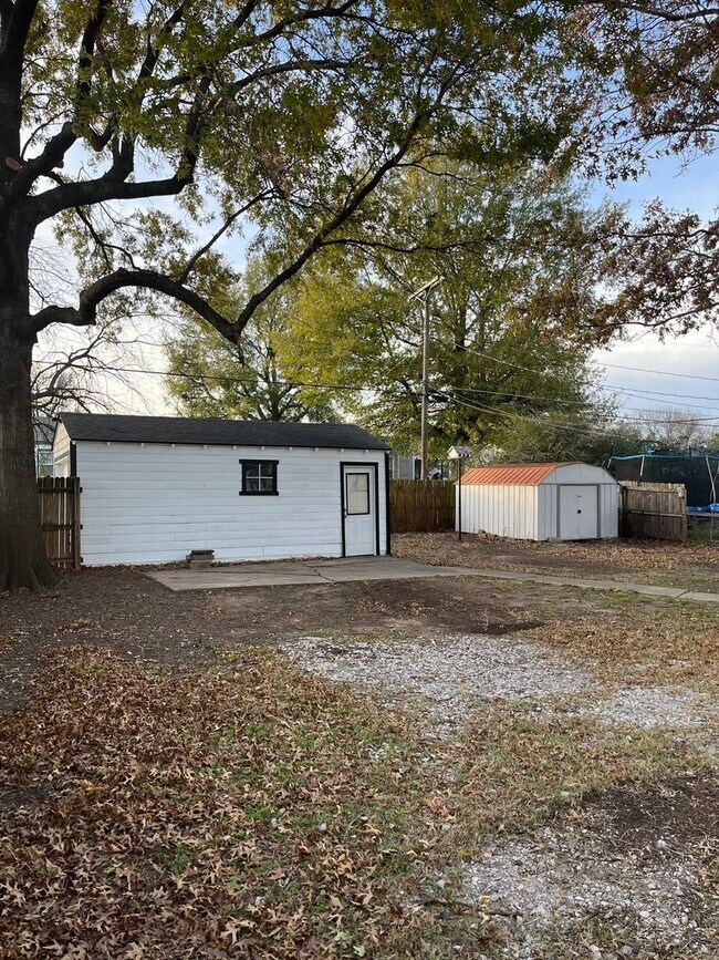 Building Photo - Step into this beautifully updated 1950's gem, where charm meets modern convenience