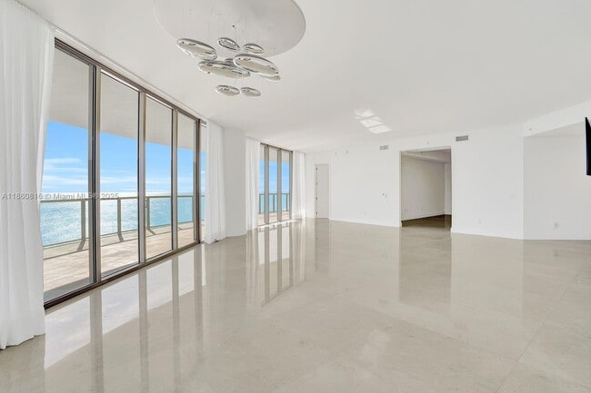 Building Photo - 9703 Collins Ave