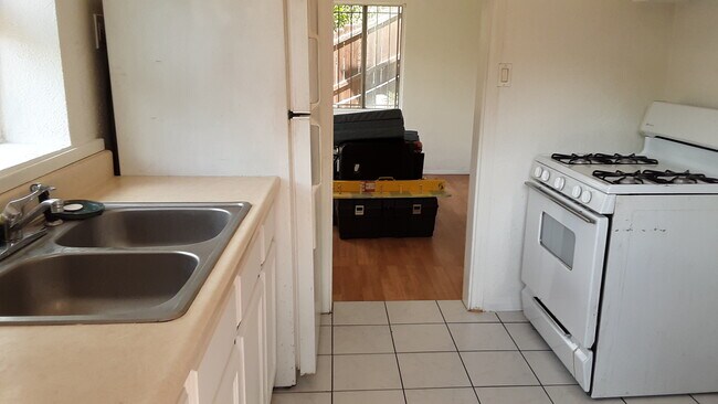 Kitchen into Living Room - 3214 Johnston St