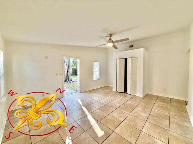 Building Photo - Spacious 4-Bedroom Home with Dual Living A...