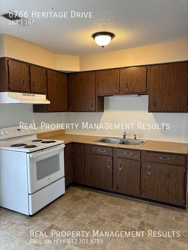 Building Photo - 6766 Heritage Dr