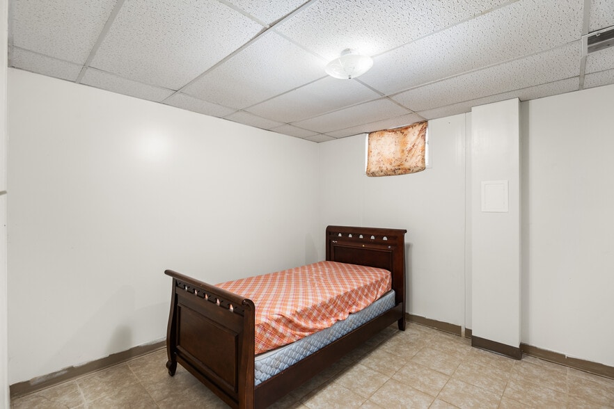 den in basement - 8063 Dulciana Ct