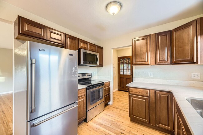Building Photo - Spacious Home w/Large Backyard Only Blocks...