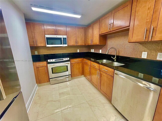 Building Photo - 8390 SW 72nd Ave