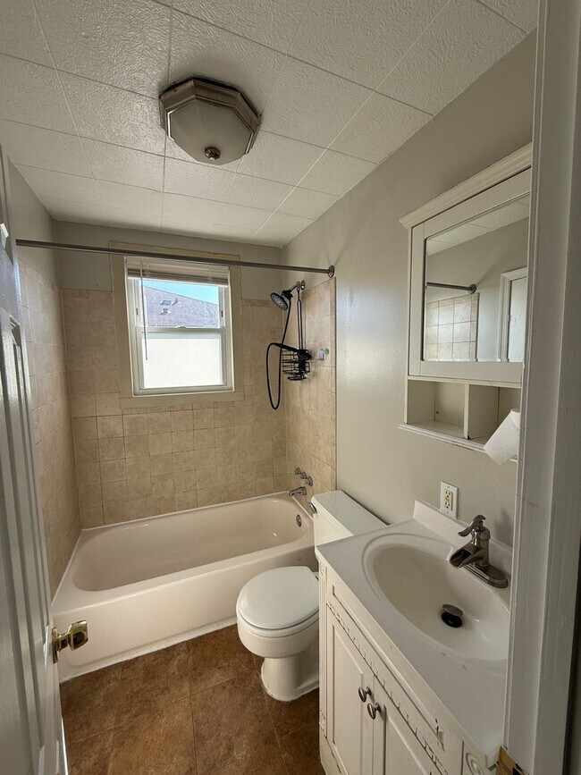 Building Photo - End Unit 3BR Townhome in Dundalk | Covered Porch, Fenced Yard, Central A/C + Off Street Parking