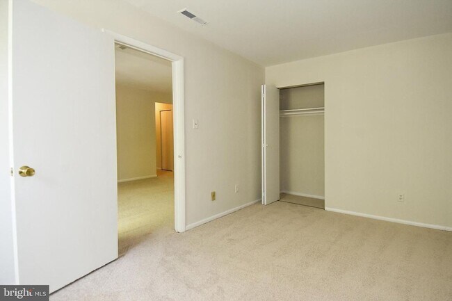 Building Photo - Commuter friendly location has easy access to I495 & Route 50. Metro bus stop in community.