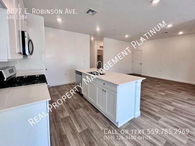 Building Photo - 6077 E Robinson Ave