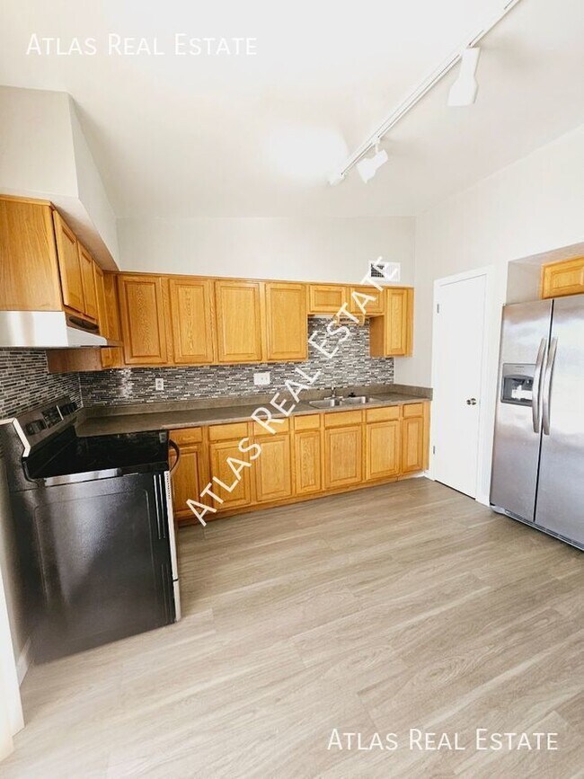 Building Photo - 7015 E Wilshire Dr