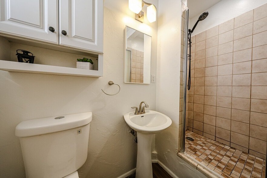 ensuite bathroom with shower and newer toilet - 3022 N 37th St