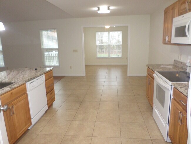 Kitchen into Dinette into Sunroom/Den - 18 Klines Cv