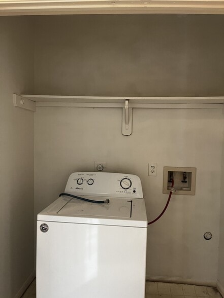 laundry room with washer - 11807 Chetman Dr
