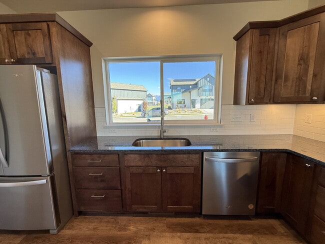 Building Photo - Lock-and-Leave Luxury Living — Lawn Care &...