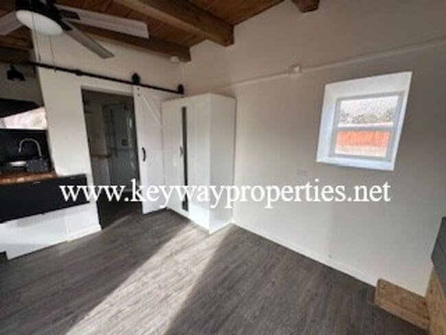 Building Photo - Sandia Canyon Studio Apartment Utilities Included