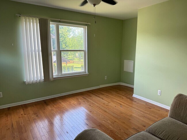 Building Photo - Large 2 Story home with 3 Bedrooms, 2.5 baths, hardwood floors, office and finished basement