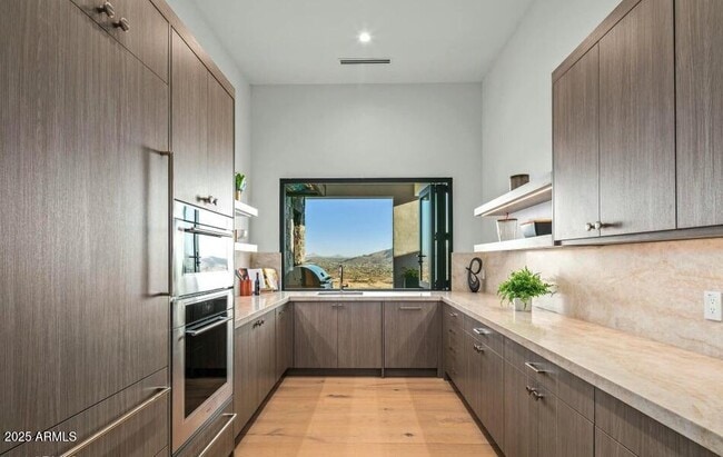 Building Photo - 4880 E Lone Mountain Rd N