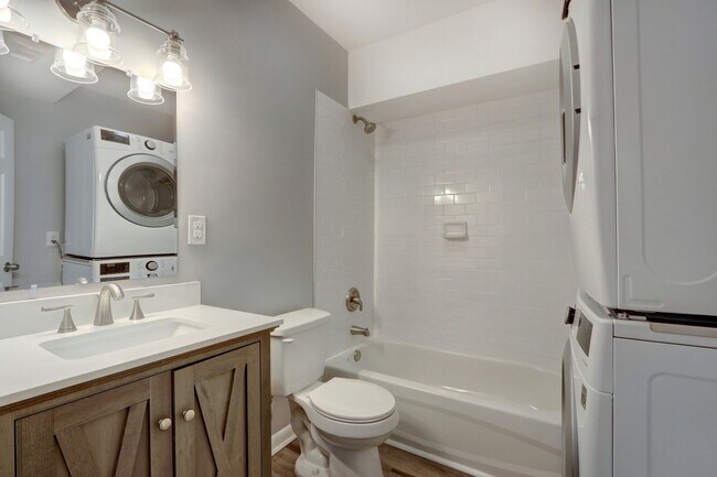 Building Photo - New Construction - Three Bedroom, Three Bathroom Home with yard & parking!