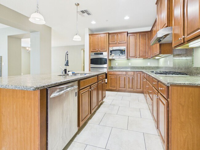 Building Photo - Spacious 5-Bedroom Solar Home in Blackstone with Resort Style Amenities
