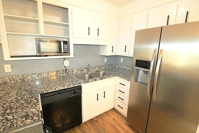 Building Photo - Remodeled 2 Bedroom with a covered porch!