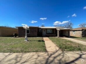 Building Photo - Eye-Catching 4-bedroom 1-bath Retreat with...