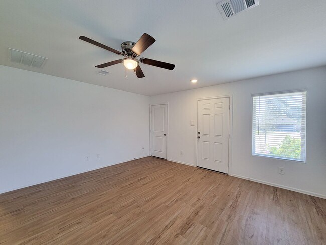 Building Photo - This single-story home has a comfortable layout with three bedrooms and a living area all on one ...