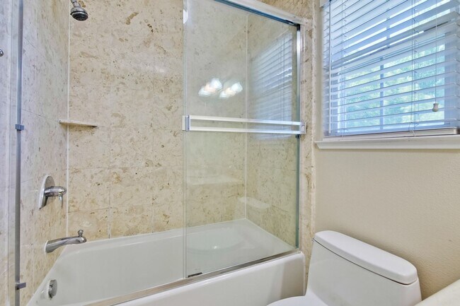 Building Photo - Awesome Home Located in a Quiet Tree Line Neighborhood