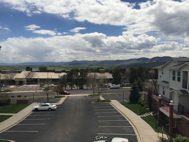 Building Photo - Available Now- 2 Bed/2 Bath Top Floor Condo with Covered Garage Space and Additional Storage