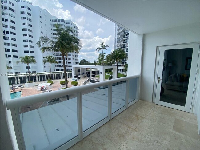 Building Photo - 10275 Collins Ave