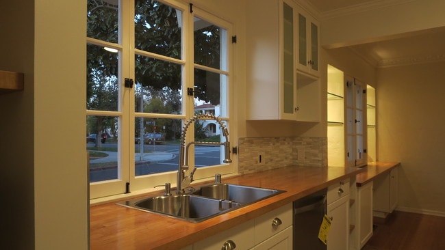 Kitchen and Outdoor View at Dusk - 1103 S Crescent Heights Blvd