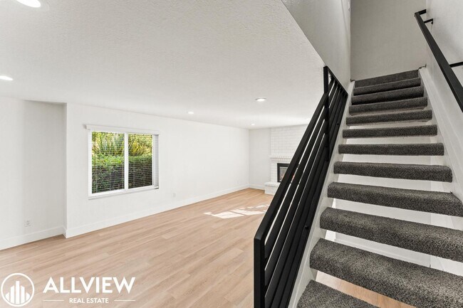 Building Photo - Upgraded 2-Bedroom Townhome in the Gated C...