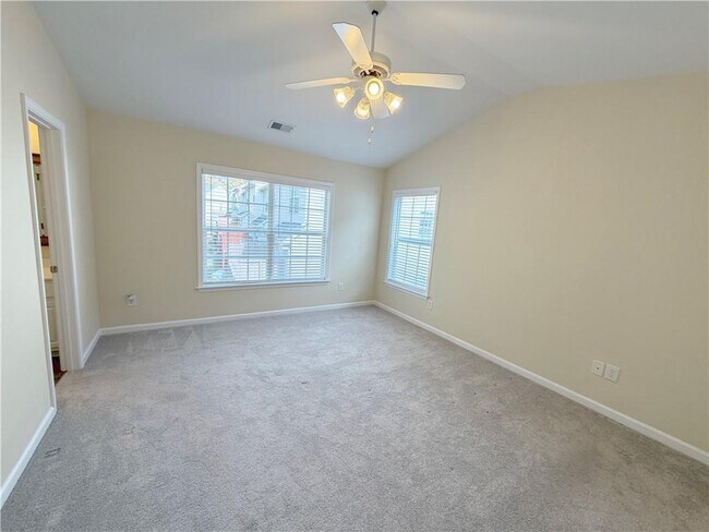 Building Photo - 4680 Creekside Villas Way