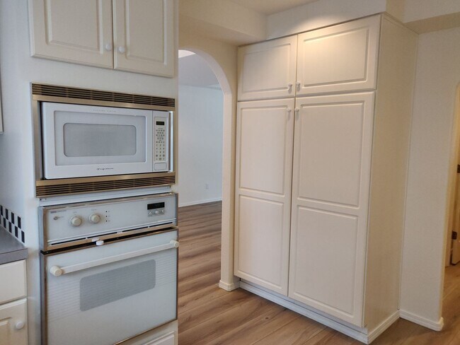 Building Photo - Spacious and charming, this two-story 4 be...