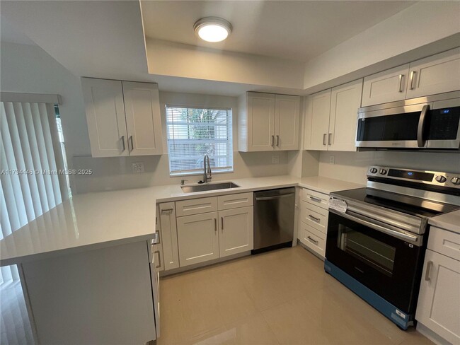 Building Photo - 12370 SW 52nd Pl