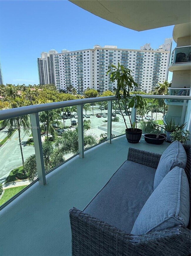 Building Photo - 19380 Collins Ave