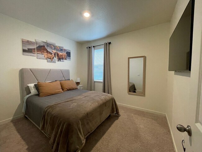 Building Photo - Live Lavishly in Harmony Ridge- Fully Furnished 5-Bedroom Dream Home with Backyard Oasis & Speake...