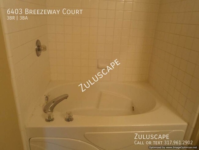 Building Photo - 6403 Breezeway Ct