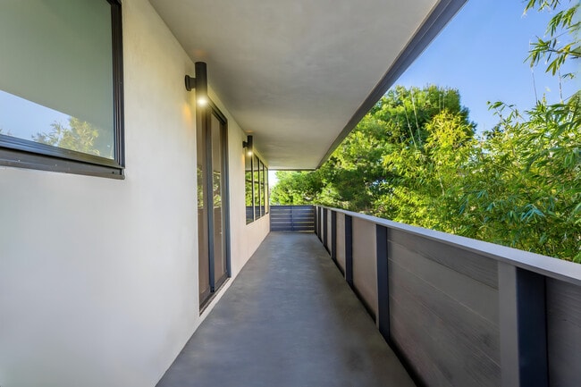 Primary Suite Private Balcony - 7611 Rindge Ave