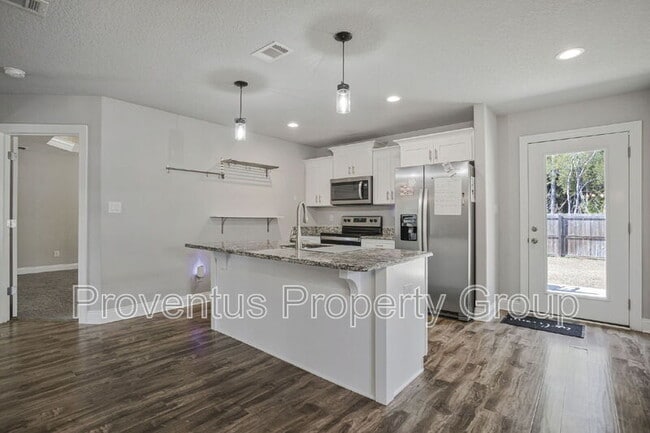 Building Photo - 7198 Gordon Evans Rd