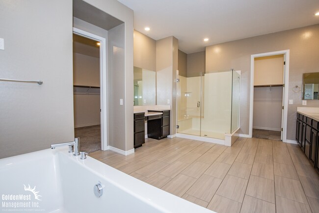 Building Photo - Welcome to this impressive single-story 4Bdm 3.5Ba residence located in a desirable Northwest Las...