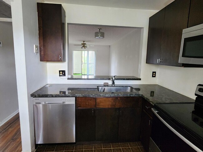 Building Photo - 7149 Golf Colony Ct